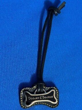 VINTAGE DOONEY & BOURKE SCOTTIE DOG BONE HANG TAG BAG CHARM ( SCOTTISH TERRIER )